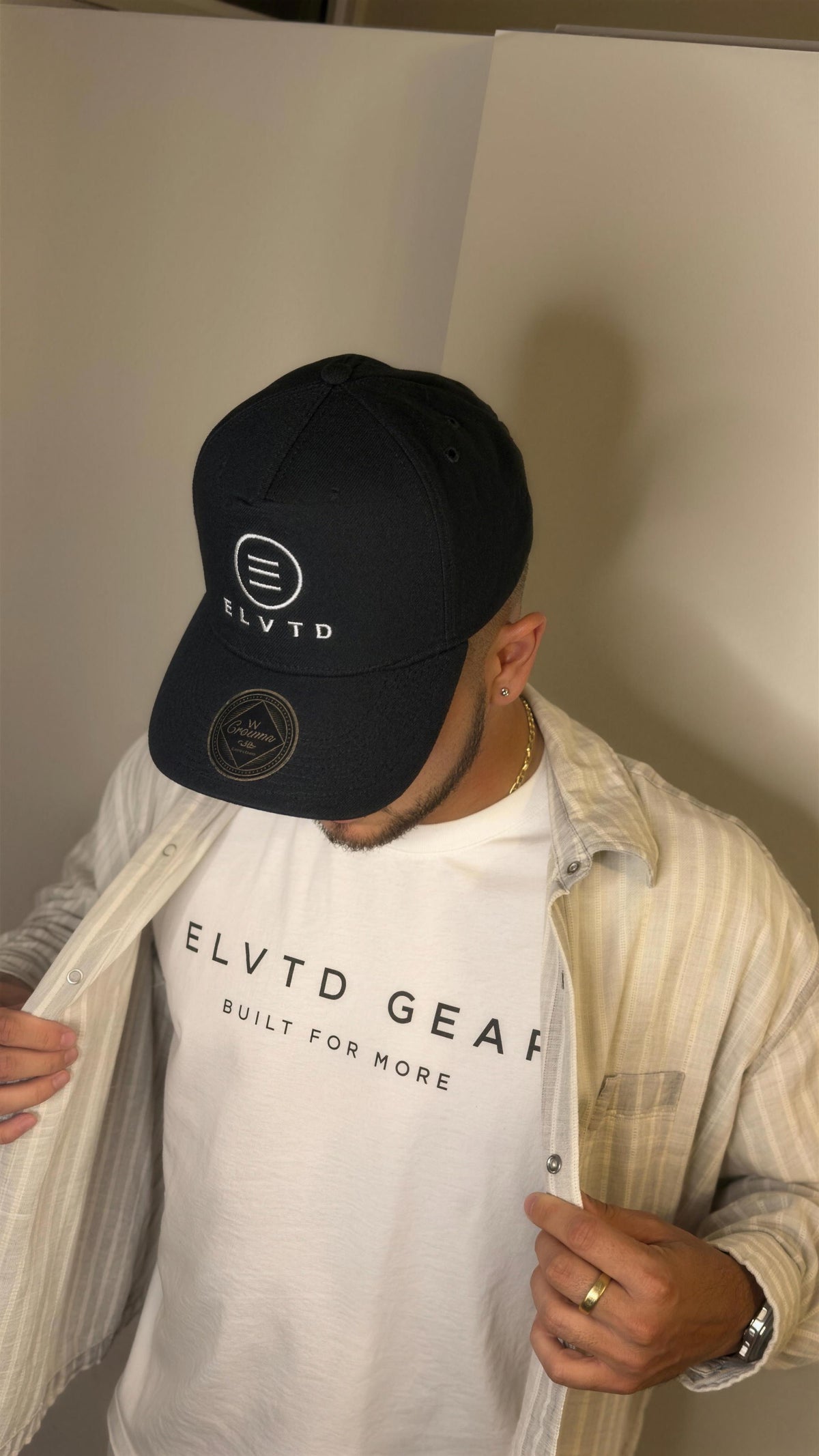cap navy tee white portrait (enhanced)